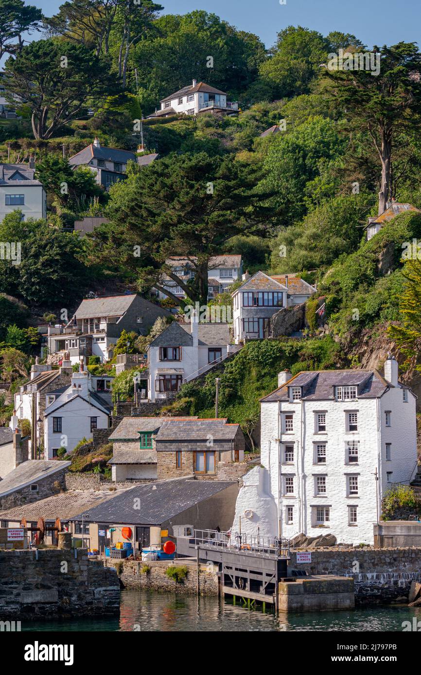 The calm and tranquility of Polperro Harbour on a hot July day - Polperro, Cornwall, UK. Stock Photo
