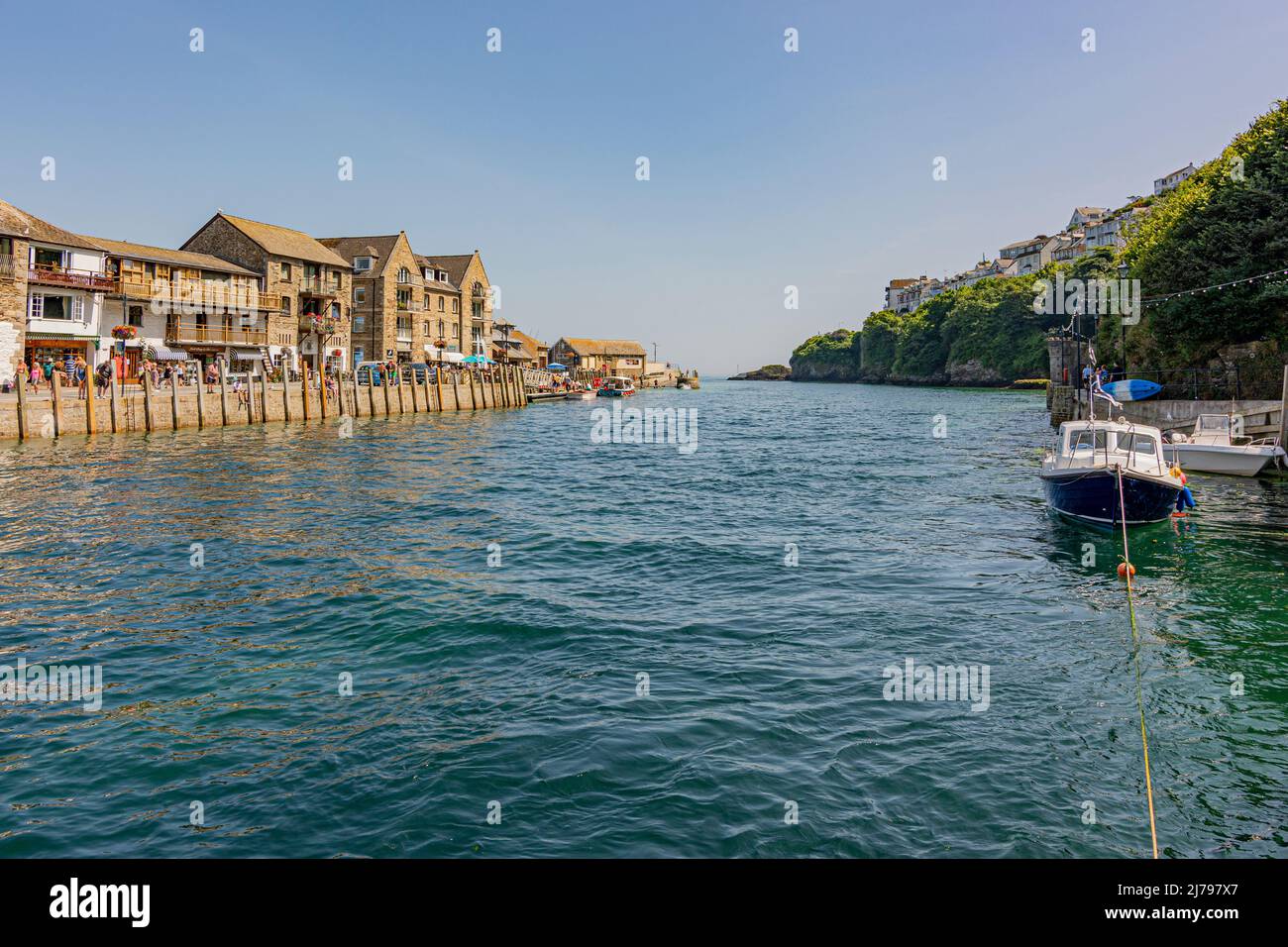 Looking south along the East Looe River towards the mouth of the river on a hot July day - Looe, Cornwall, UK. Stock Photo