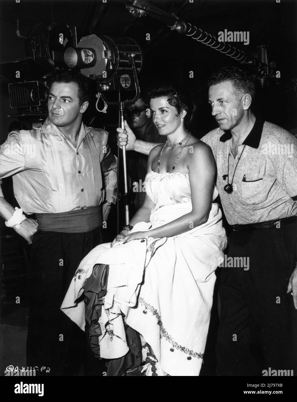 CORNEL WILDE JANE RUSSELL and Director NICHOLAS RAY on set candid during filming of HOT BLOOD 1956 story Jean Evans screenplay Jesse Lasky Jr. music Les Baxter cinematographer Ray June Columbia Pictures Stock Photo