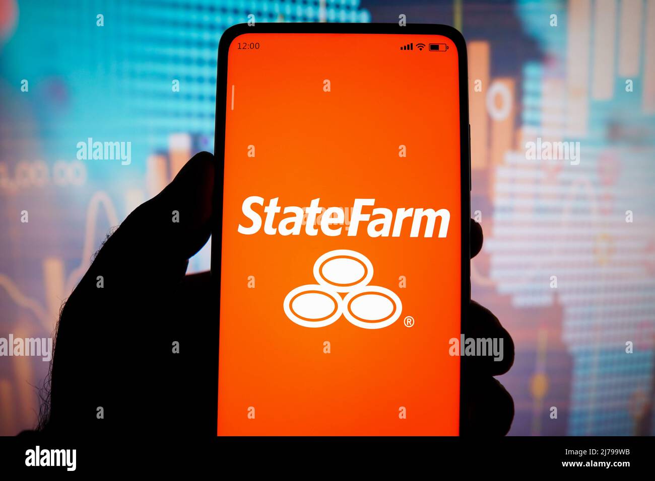 In this photo illustration, the State Farm Insurance logo seen