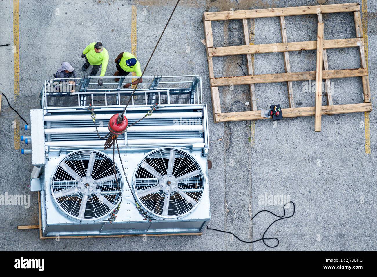 Miami Beach Florida construction lifting crane HVAC AC air conditioner cooling tower Stock Photo