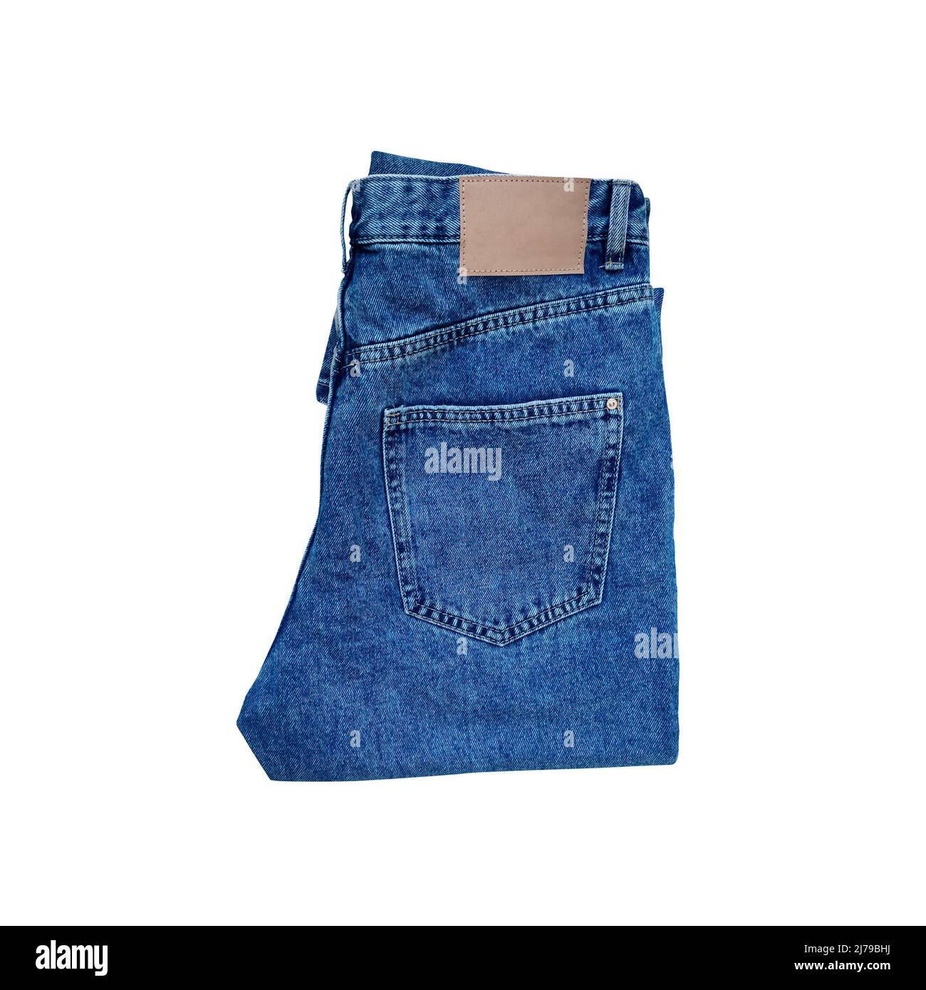 Blue folded denim jeans isolated on white background. Stock Photo