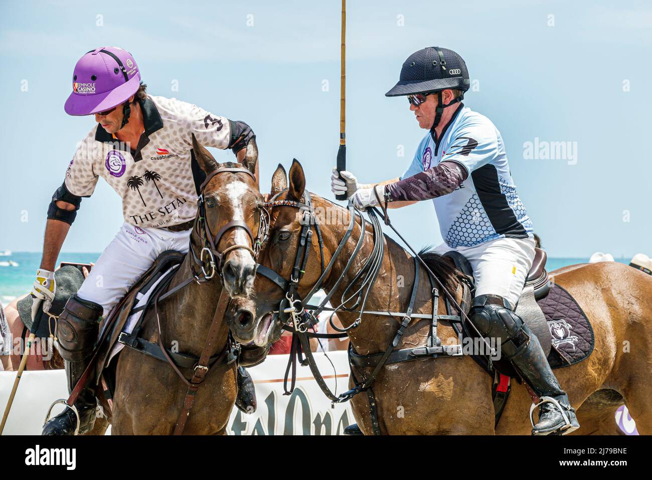 Miami Beach Florida Beach Polo World Cup Miami annual event game chukker ponies horses players player mallets mallet ball Stock Photo
