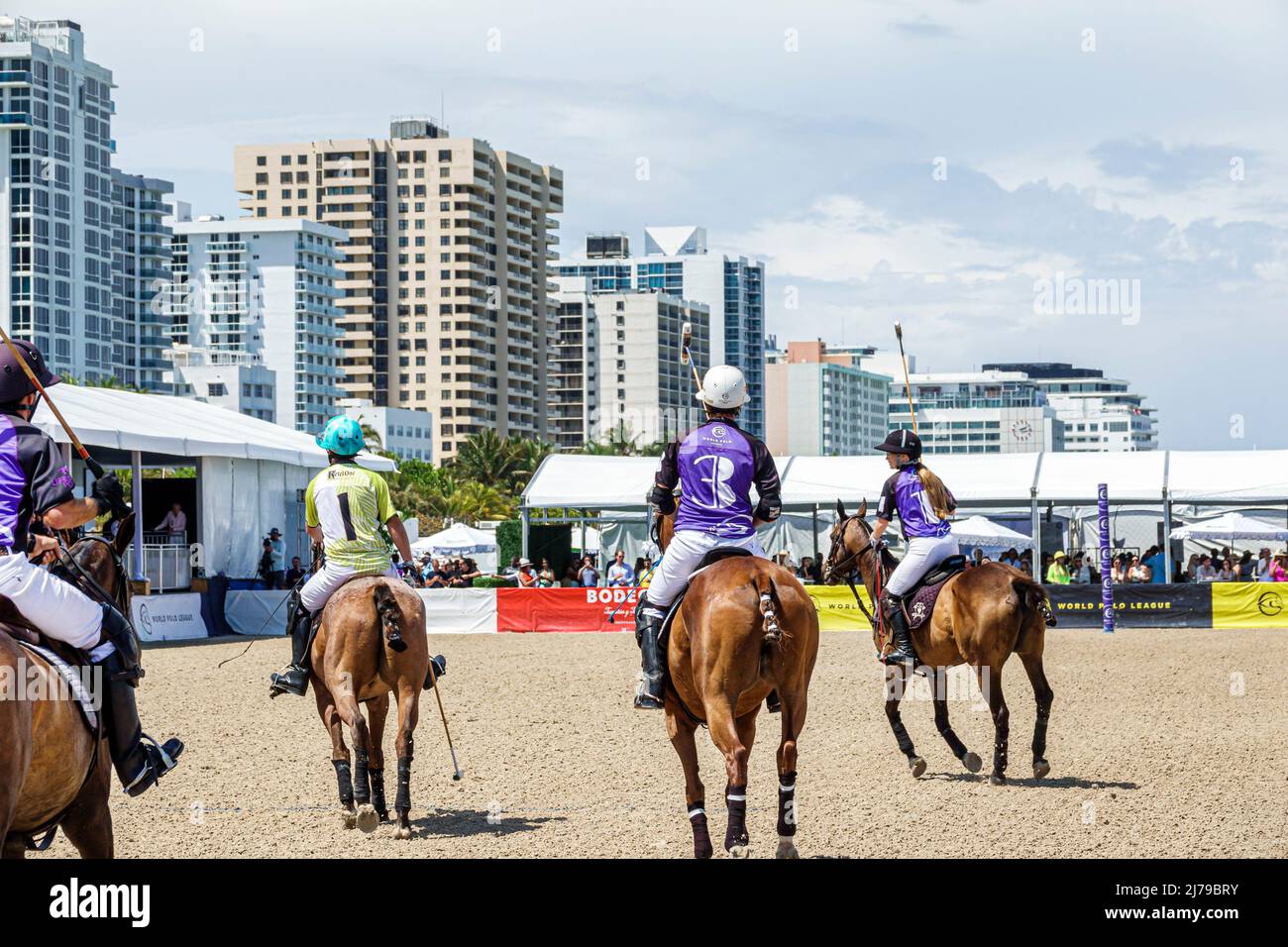 Miami Beach Florida Beach Polo World Cup Miami annual event game chukker ponies horses players player mallets mallet ball Stock Photo