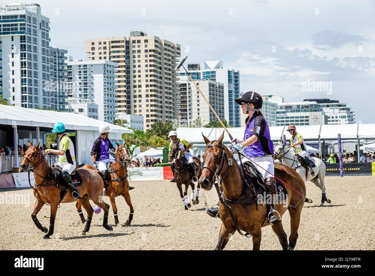 Miami Beach Florida Beach Polo World Cup Miami annual event game chukker ponies horses players player mallets mallet ball Stock Photo