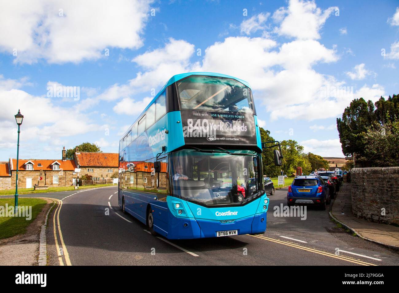 Yorkshire rural bus service 840 from Leeds to Whitby passing through the village of Goathland, North Yorkshire, England, U.K. Stock Photo