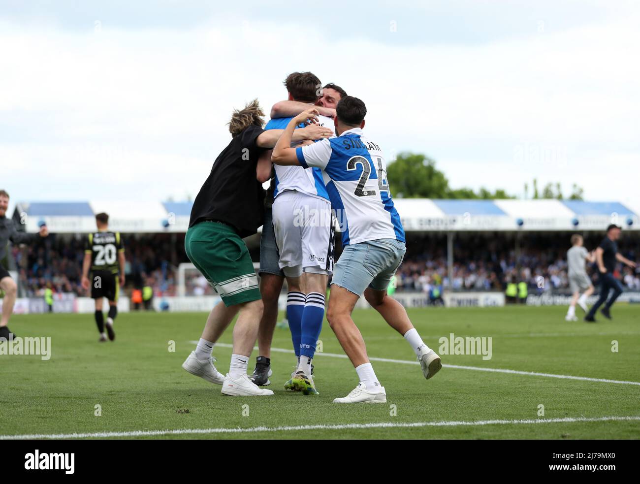 Bristol Rovers fans swarm Anthony Evans following his side's seventh goal during the Sky Bet League Two match at the Memorial Stadium, Bristol. Picture date: Saturday May 7, 2022. Stock Photo