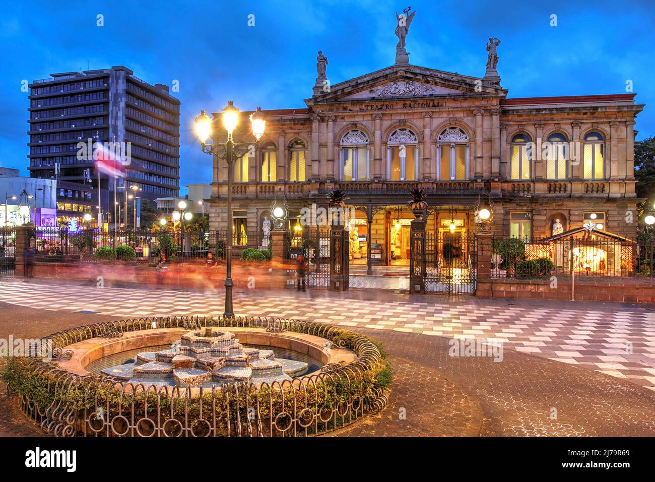 Night scene Plaza de la Cultura with the National Theatre of Costa Rica in San Jose at twilight time. Stock Photo