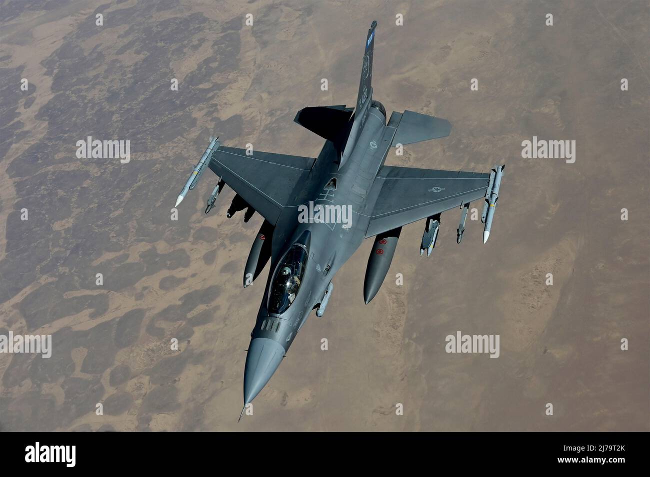 Al Kharj, Saudi Arabia. 05 May, 2022. A U.S. Air Force F-16C Fighting Falcon fighter jet, assigned to the 179th Expeditionary Fighter Squadron, approaches a KC-135R Stratotanker refueling aircraft over Prince Sultan Air Base, May 5, 2022 near Al Kharj, Saudi Arabia. Credit: MSgt. Matthew Plew/U.S. Air Force/Alamy Live News Stock Photo