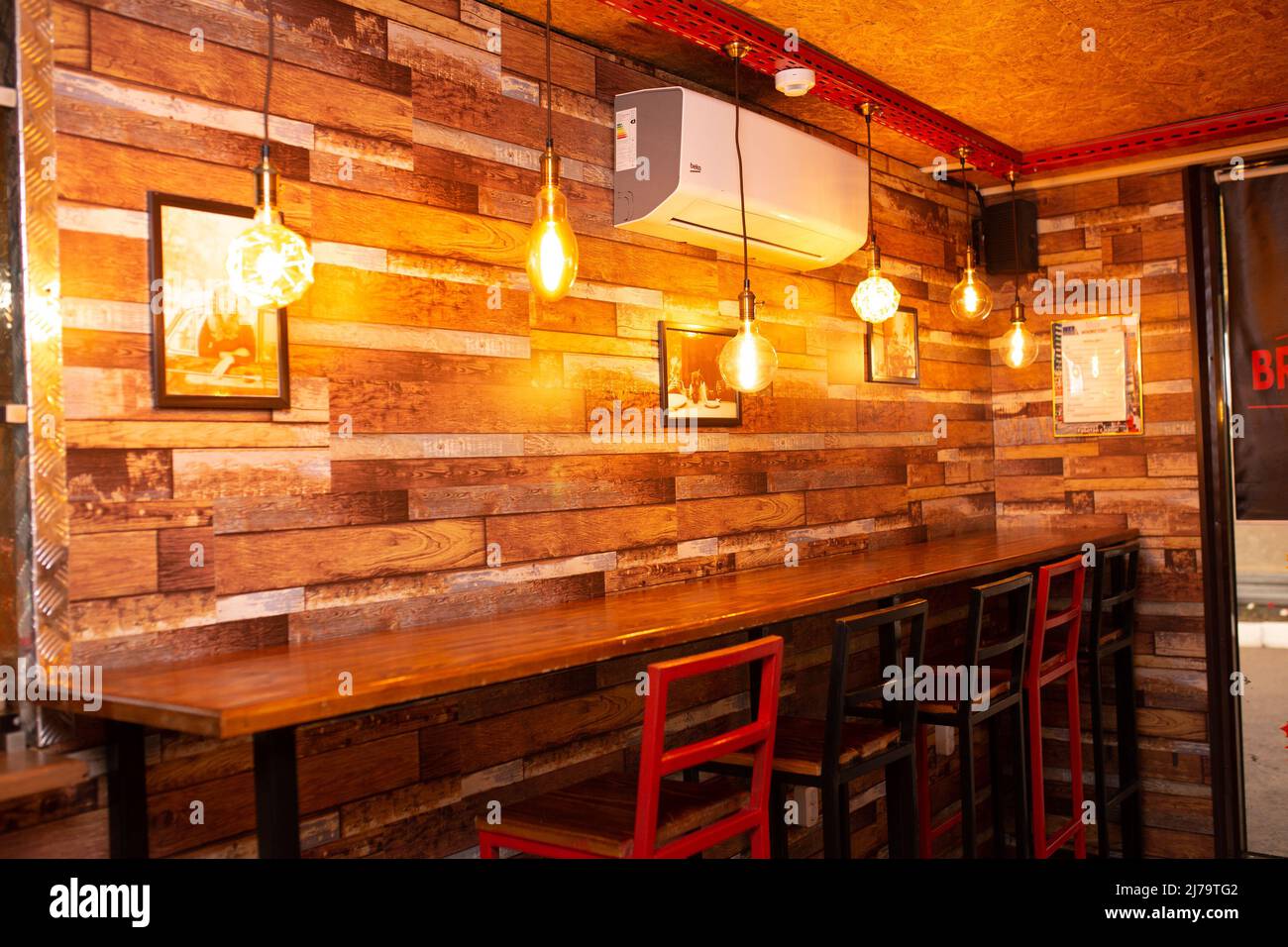 bar counter of a road cafe in wooden style in warm colors Stock Photo