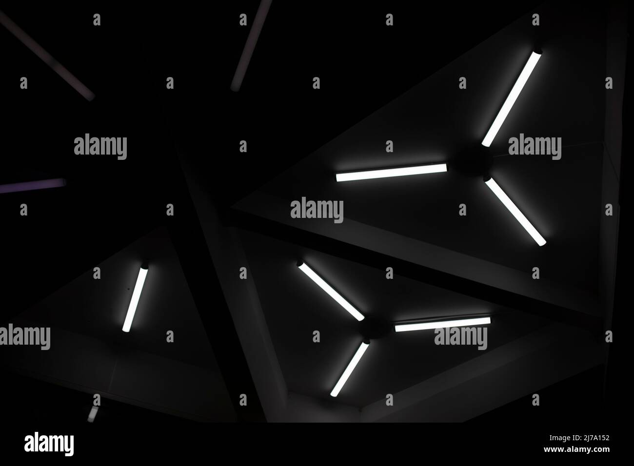 Lighting details in building. Lights. Fluorescent lights in dark Stock