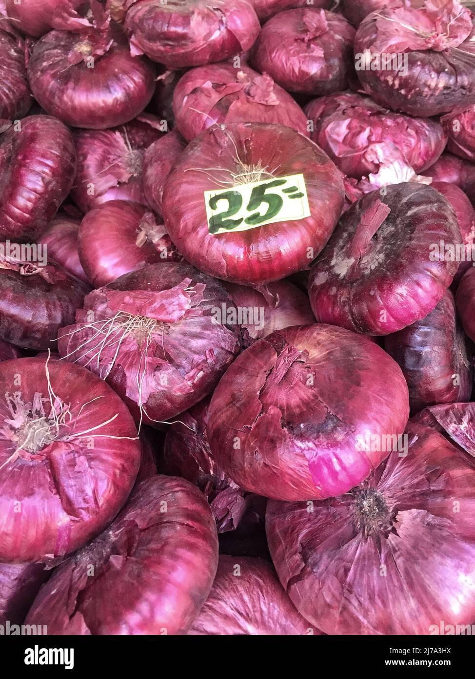 pile of onions with price label Stock Photo Alamy