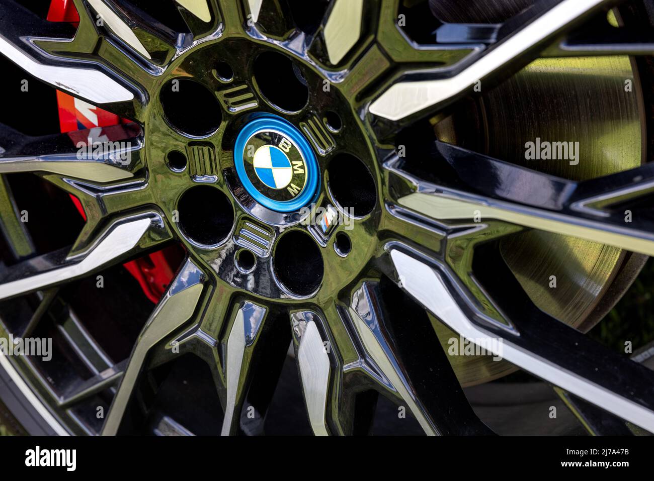 BMW i4 M50 alloy wheel Stock Photo - Alamy