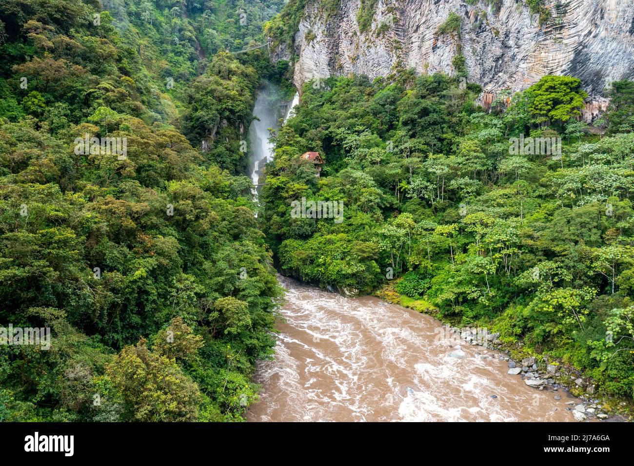 El Pailon del Diablo waterfall cascade and suspended bridge. Aerial