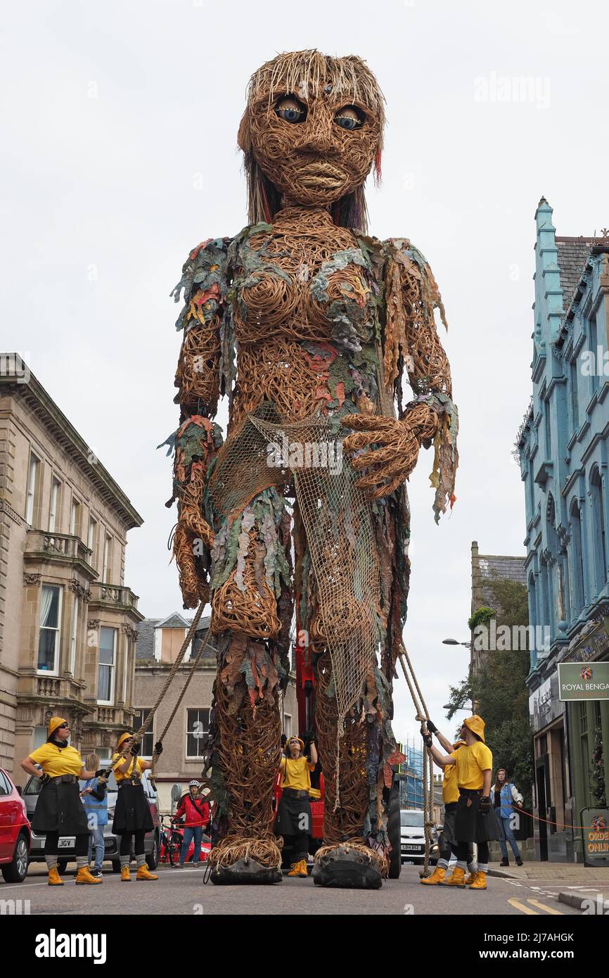 Storm, mythical sea goddess,10m tall mechanical puppet, on Nairn High St.. Made by Vision Mechanics from recycled materials and willow. Stock Photo