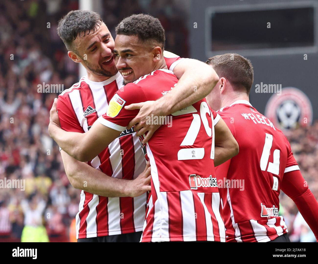 Sheffield, England, 7th May 2022.   lliman Ndiaye (C) of Sheffield Utd celebrates their second goal scored by Morgan Gibbs-White with Enda Stevens during the Sky Bet Championship match at Bramall Lane, Sheffield. Picture credit should read: Darren Staples / Sportimage Credit: Sportimage/Alamy Live News Stock Photo