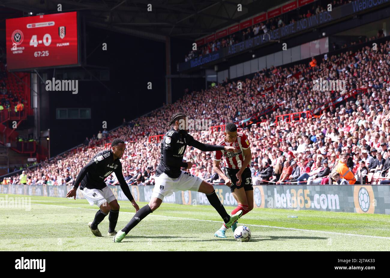 Sheffield, England, 7th May 2022.   Michael Hector of Fulham challenges Will Osula of Sheffield Utd during the Sky Bet Championship match at Bramall Lane, Sheffield. Picture credit should read: Darren Staples / Sportimage Credit: Sportimage/Alamy Live News Stock Photo