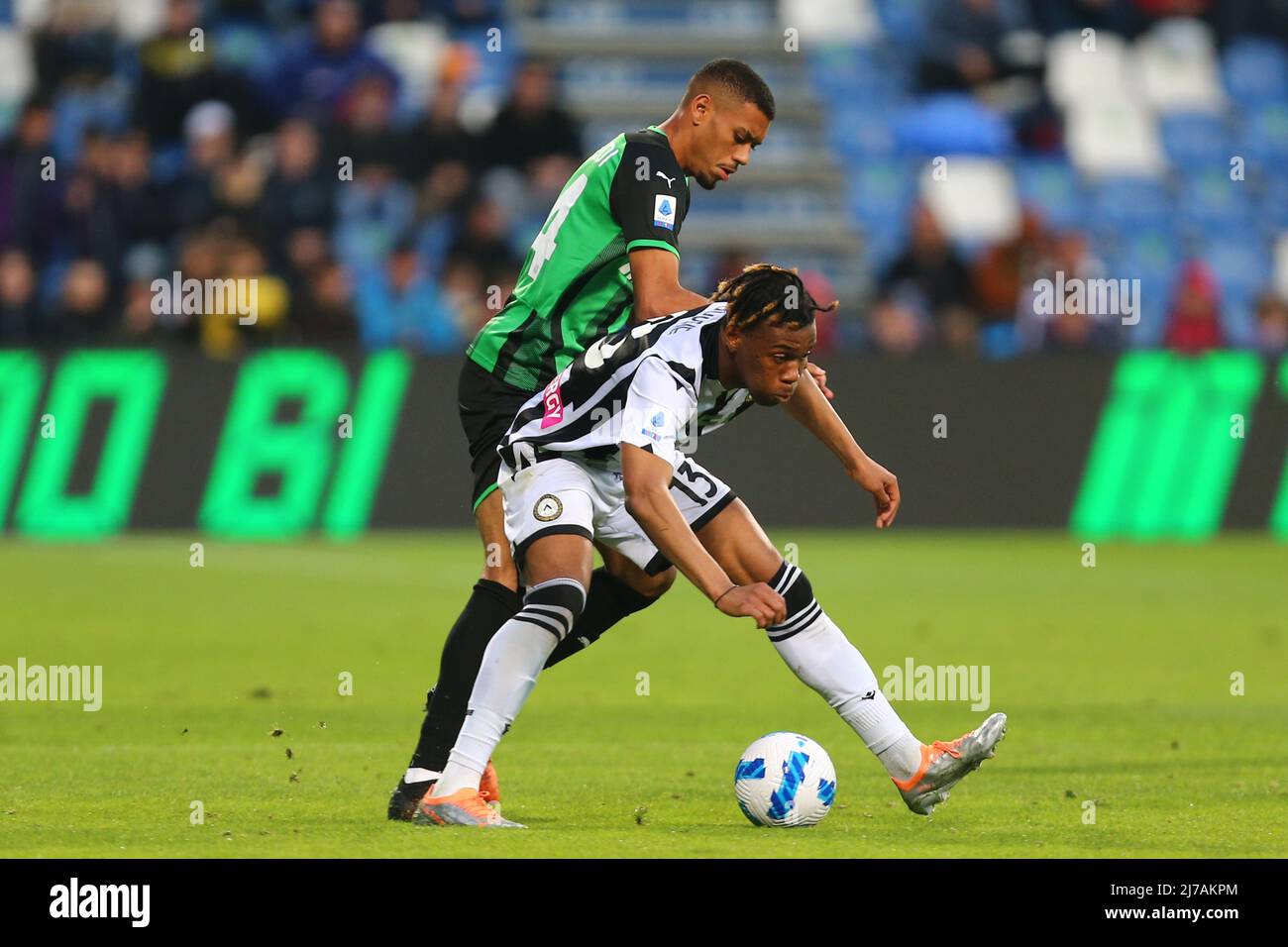 Describe wireless Specifically Ruan Tressoldi of US SASSUOLO competes for the ball with Iyenoma Udogie of  UDINESE CALCIO during the Serie A match between US Sassuolo and Udinese  Calcio at Mapei Stadium-Citta del Tricolore on