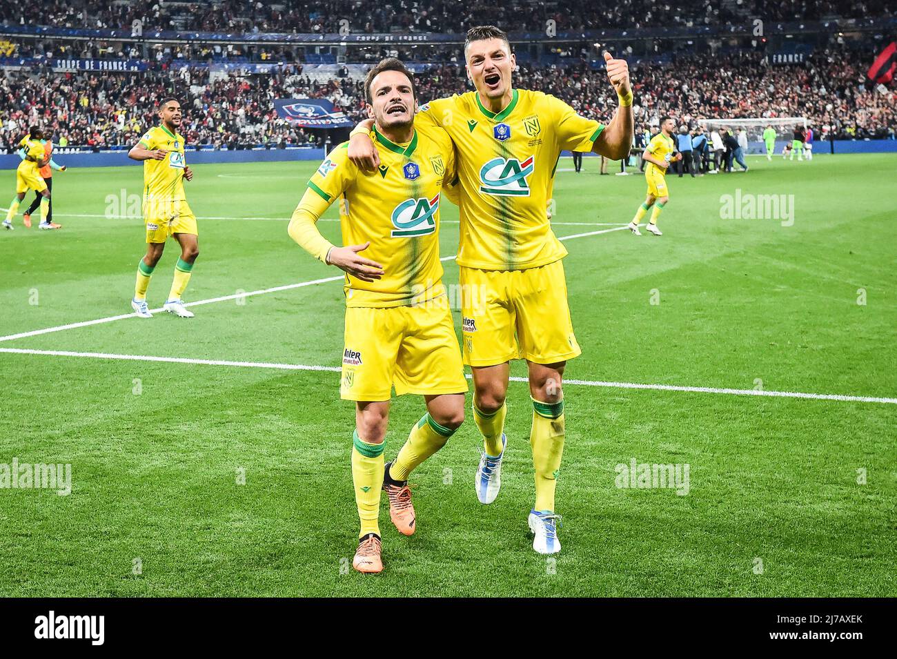 Pedro CHIRIVELLA of Nantes and Andrei GIROTTO of Nantes celebrate the  victory during the French Cup, Final football match between OGC Nice and FC  Nantes on May 7, 2022 at Stade de