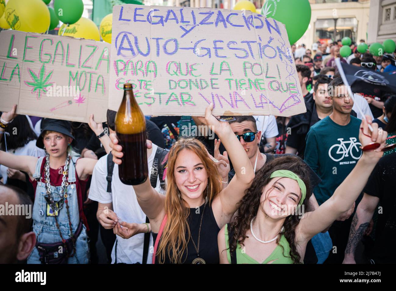 Two pro-cannabis demonstrators hold placards during a demonstration. Thousands of pro-cannabis activists took part in a demonstration in La Gran Via in Madrid, Spain, in favor of legalizing the medicinal and recreational use of marijuana. (Photo by Diego Radames / SOPA Images/Sipa USA) Stock Photo