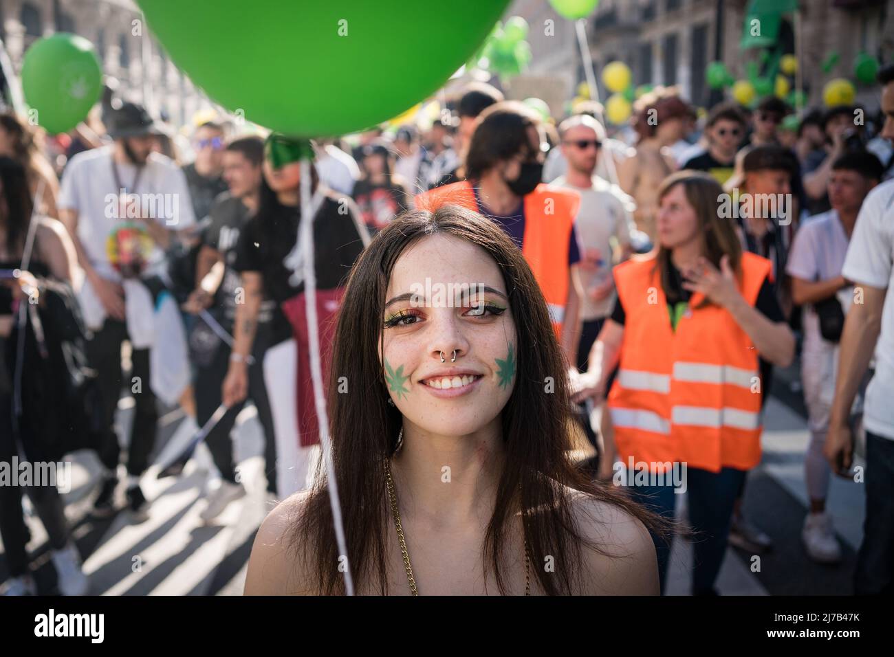A pro-cannabis protester smiles during a demonstration in the center of Madrid. Thousands of pro-cannabis activists took part in a demonstration in La Gran Via in Madrid, Spain, in favor of legalizing the medicinal and recreational use of marijuana. (Photo by Diego Radames / SOPA Images/Sipa USA) Stock Photo