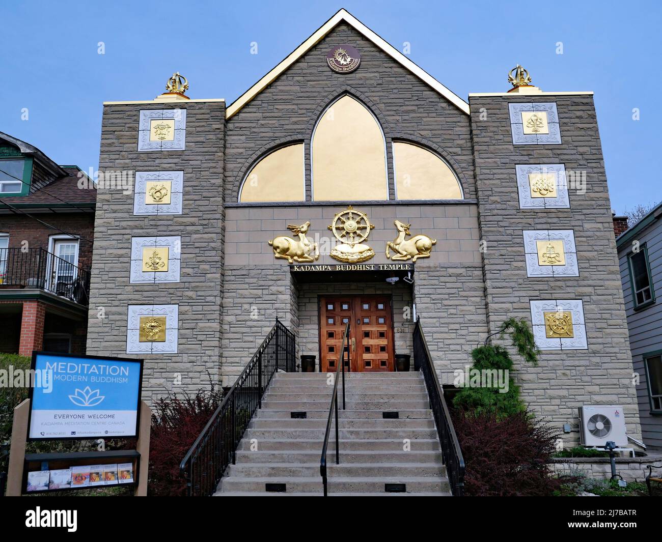 Toronto, Ontario, Canada - May 6, 2022:  Buddhist temple in a modern building with colorful golden decorations Stock Photo