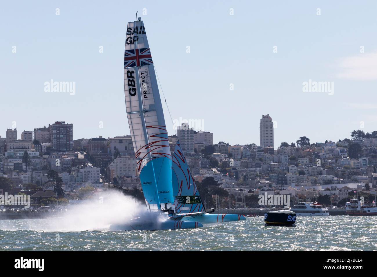 Led by Driver Ben Ainslie the Great Britian  F50 Catamaran rounds the buoy while racing in the waters of San Francisco Bay during the 2022 SailGP race Stock Photo