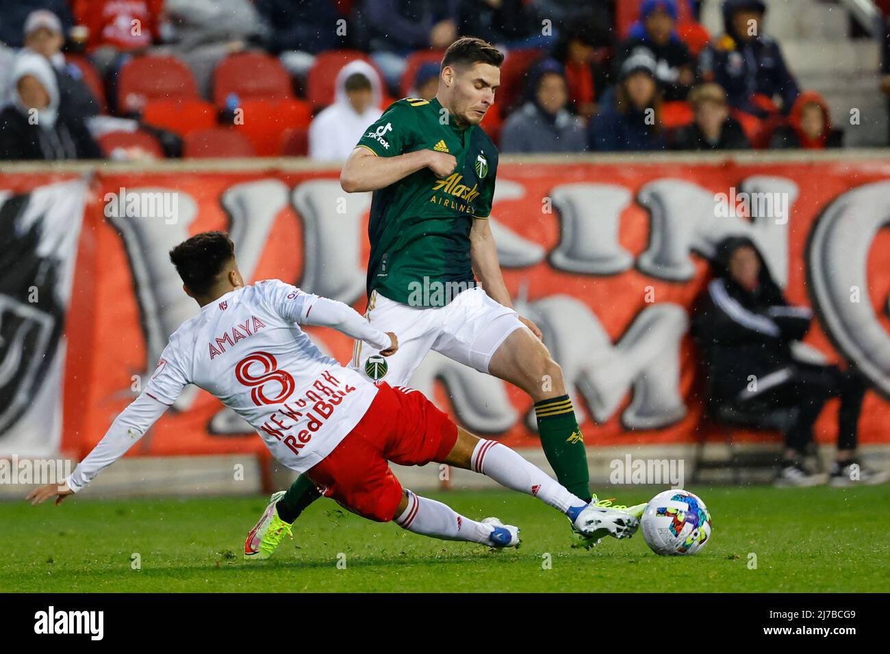 HARRISON, NJ - MAY 07:  Portland Timbers forward JarosÅ‚aw Niezgoda (11) looks to go around New York Red Bulls midfielder Frankie Amaya (8) during the first half of the Major League Soccer game between the New York Red Bulls and the Portland Timbers on May 7, 2022 at Red Bull Arena in Harrison, New Jersey. (Credit Image: © Rich Graessle/Icon SMI via ZUMA Press) Stock Photo