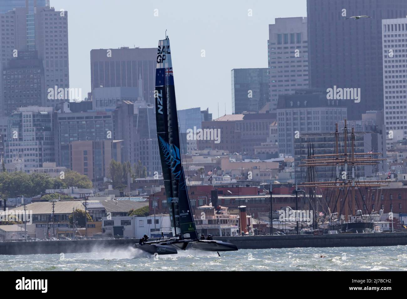 The New Zealand team races their F50 catamaran on the waters of San Francisco Bay during the 2022 SailGP races. Stock Photo