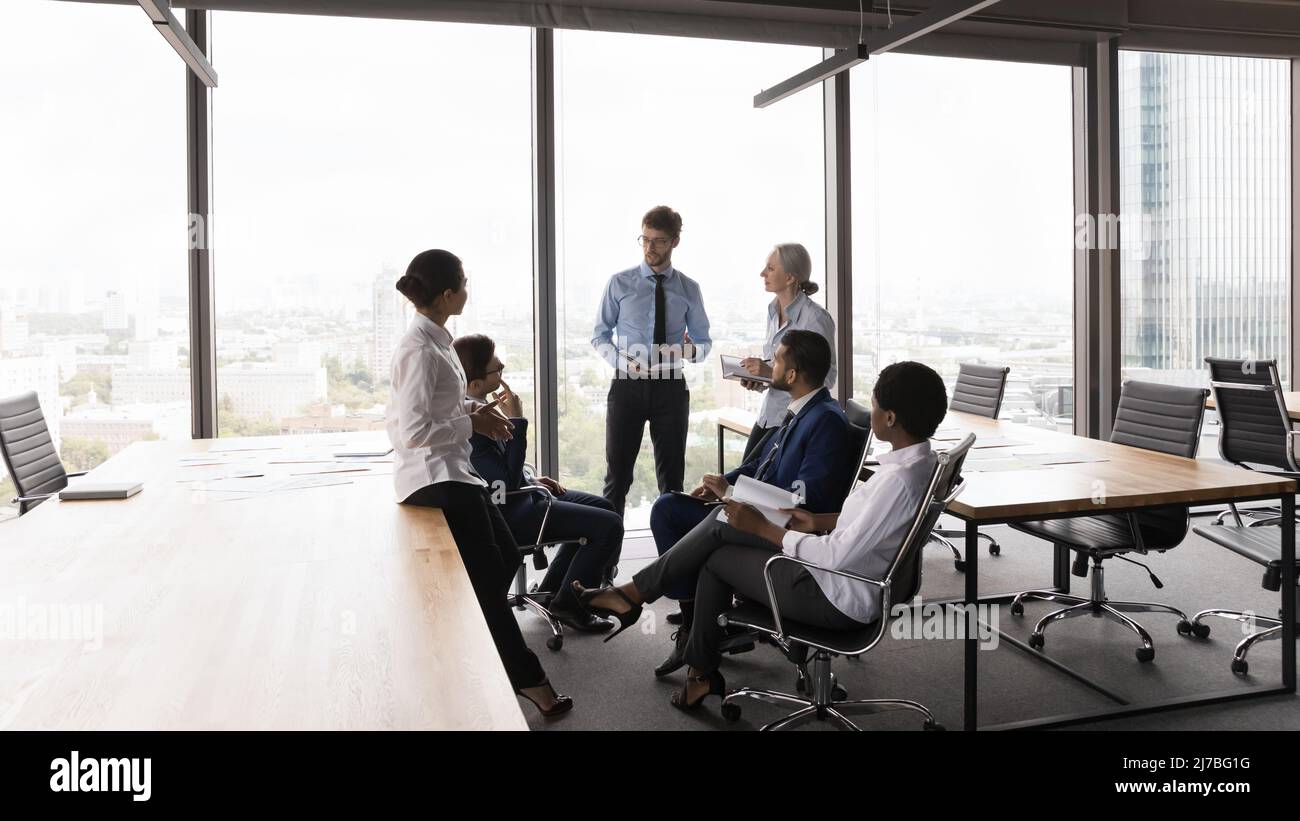 Diverse business group brainstorming in modern office open space Stock Photo