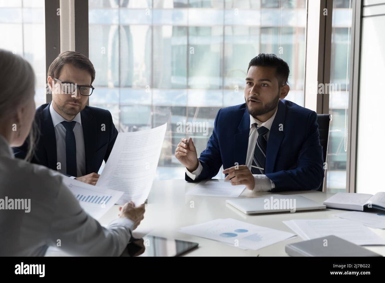 Job candidate and employer discussing work experience Stock Photo