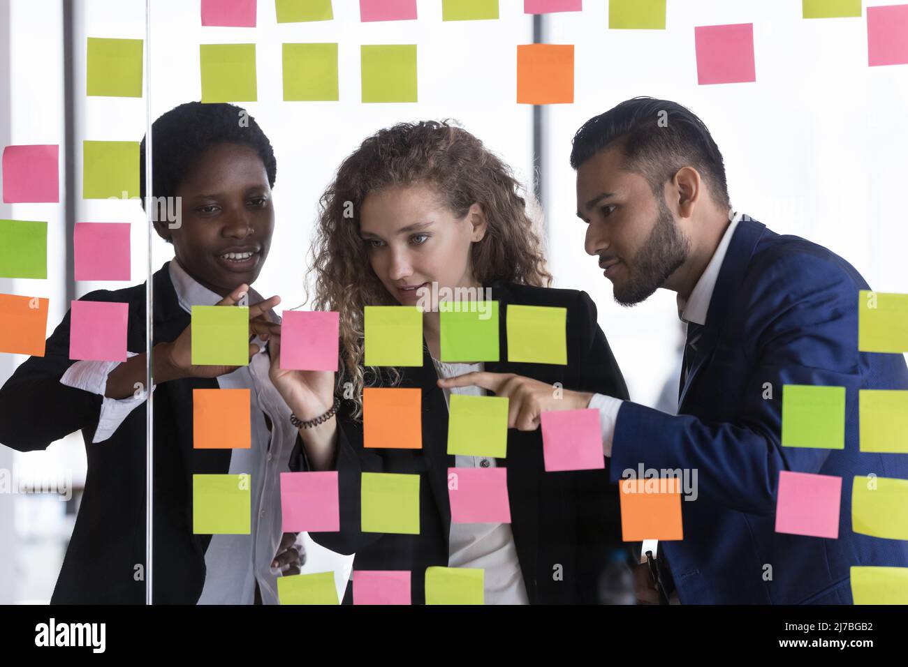 Motivated diverse business team planning project tasks Stock Photo