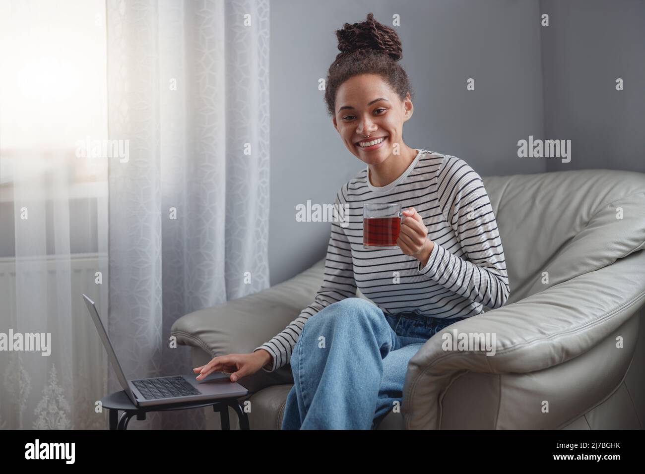 Female sitting in chair hi-res stock photography and images - Alamy