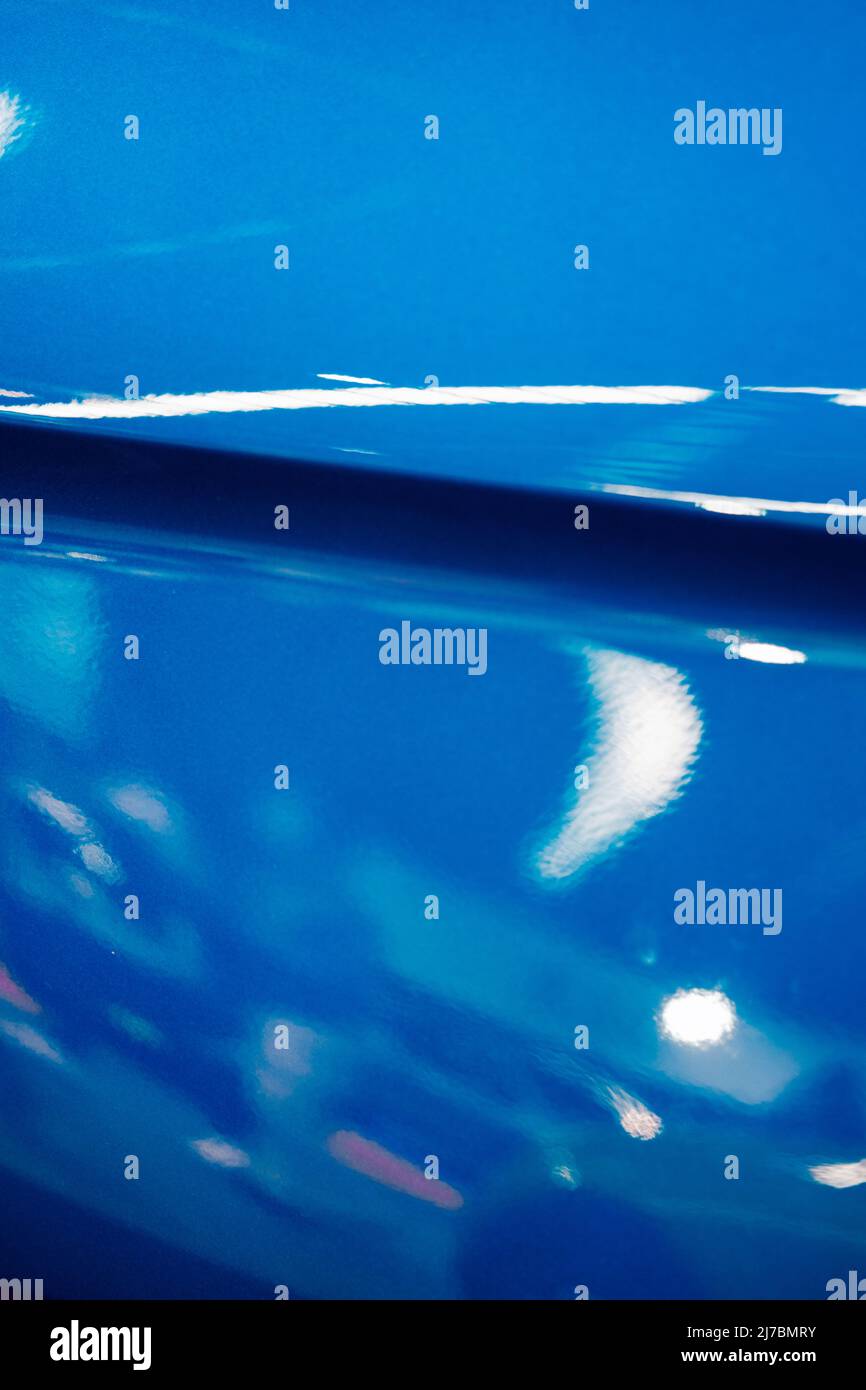 Metallic bended blue surface with reflections Stock Photo