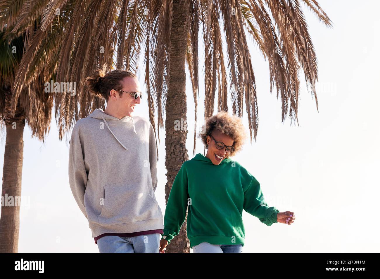 couple dancing and having fun while strolling Stock Photo