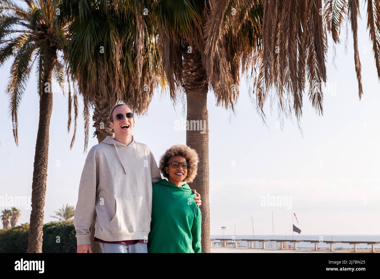 young couple having good time while taking a walk Stock Photo