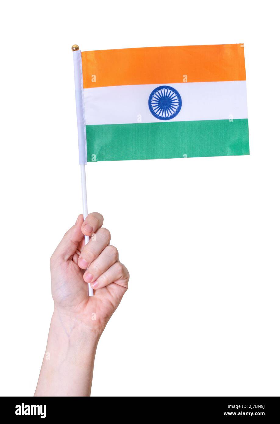 A hand holds the flag of India against a white isolated background. The concept of a great country. Stock Photo
