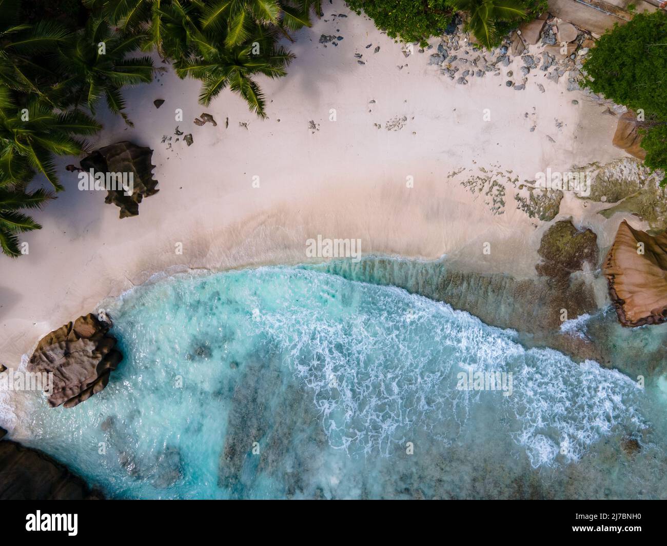 Anse Patates beach, La Digue Island, Seychelles, white beach with blue