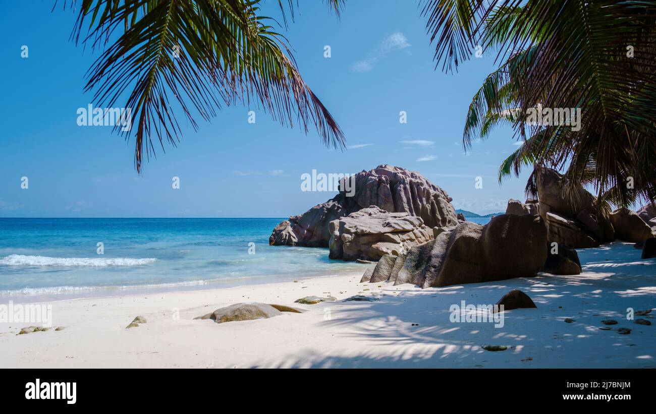 Anse Patates beach, La Digue Island, Seychelles, white beach with blue