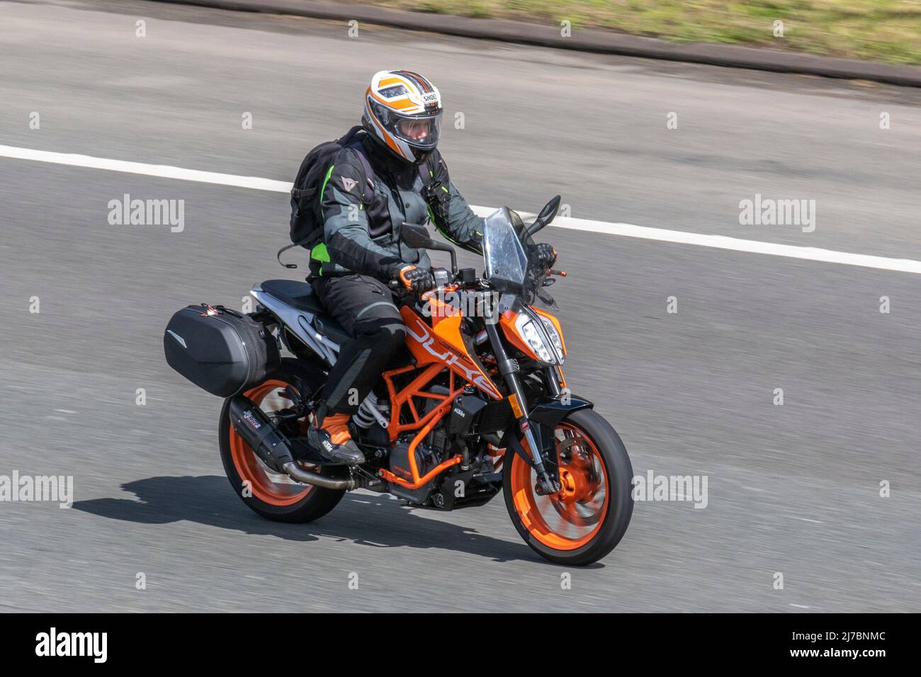 THE KTM 125 Duke motorcycle ride on the M61 motorway UK Stock Photo - Alamy
