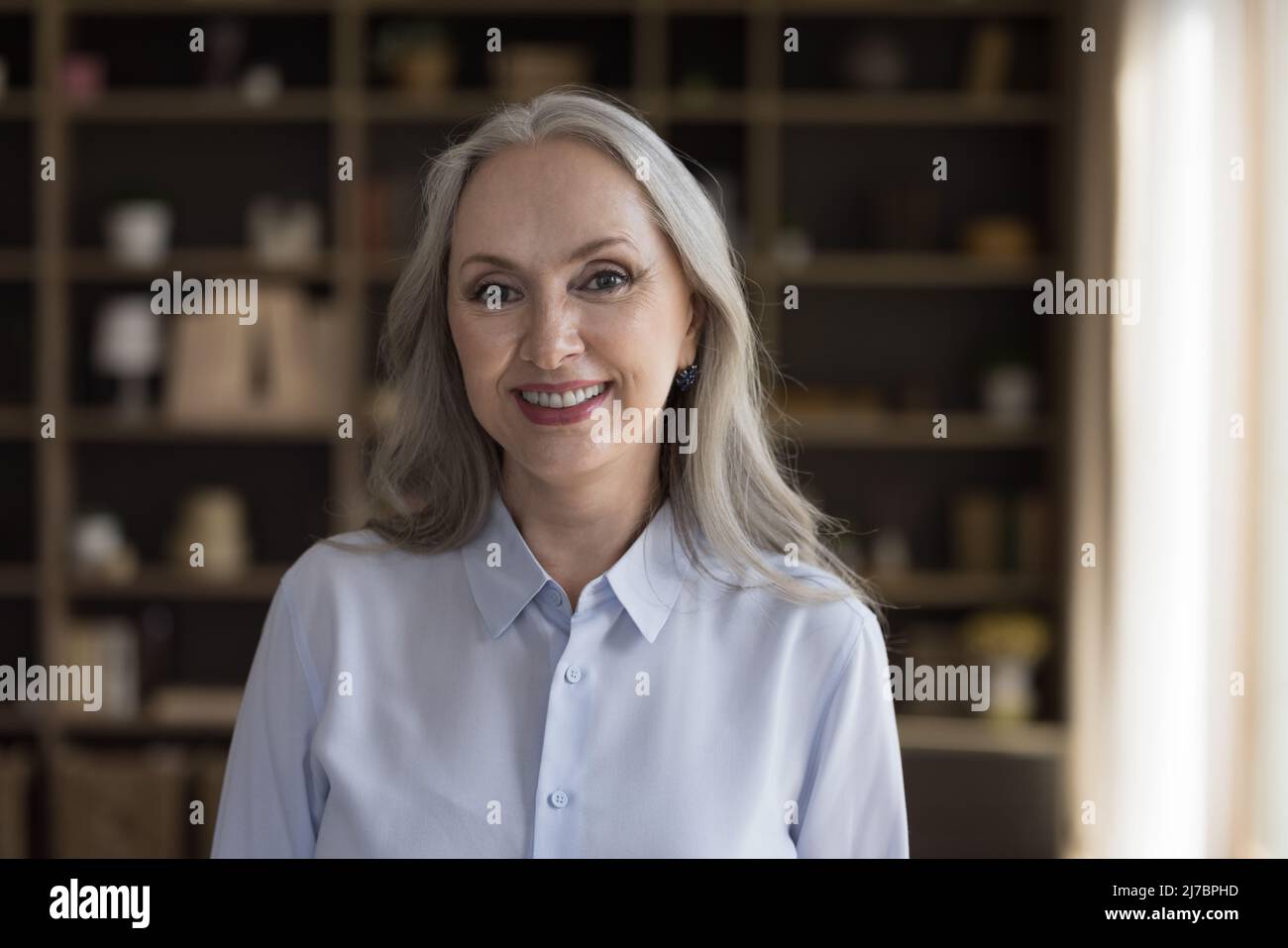 Grey haired middle aged woman hi-res stock photography and images - Alamy