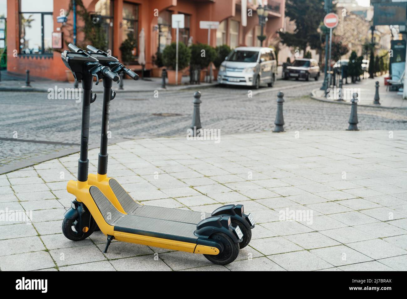 Electric scooters for rental . Vehicle rent service background. Electric kick scooters for transportation Stock Photo