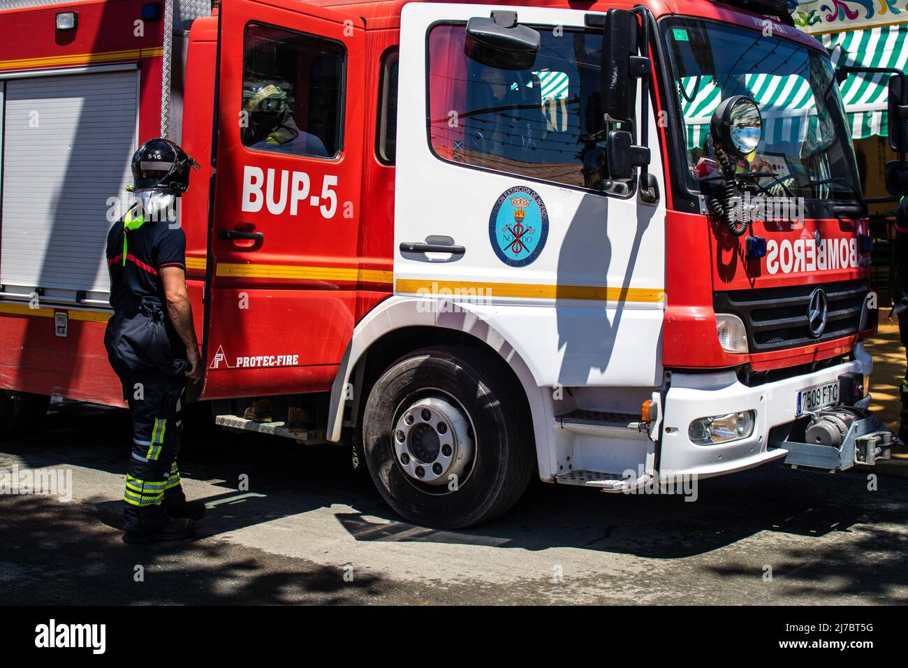 Seville, Spain May 05, 2022 Firefighter in intervention at Feria de Sevilla, the most famous