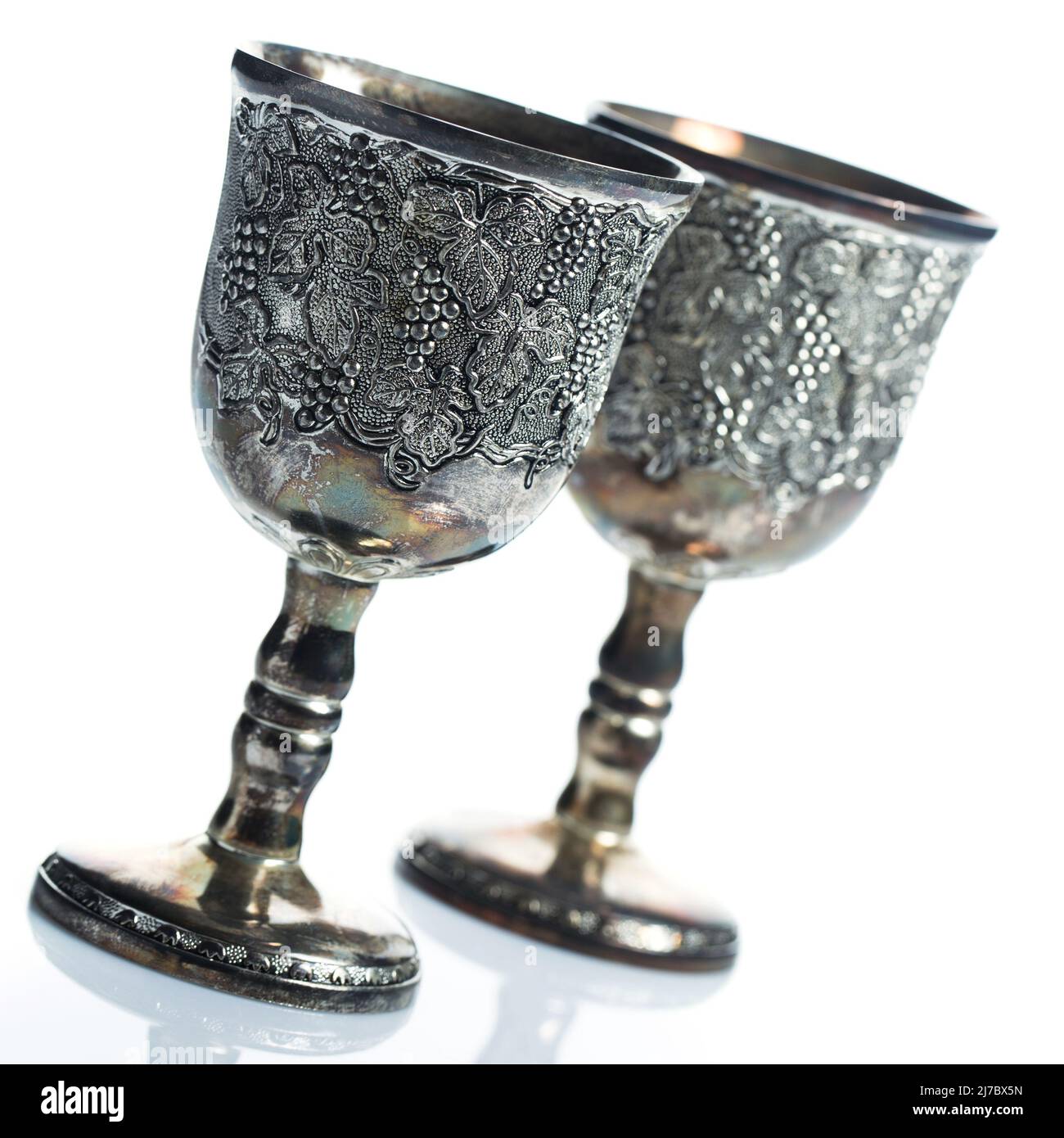 Old wine silver goblets on white background Stock Photo Alamy