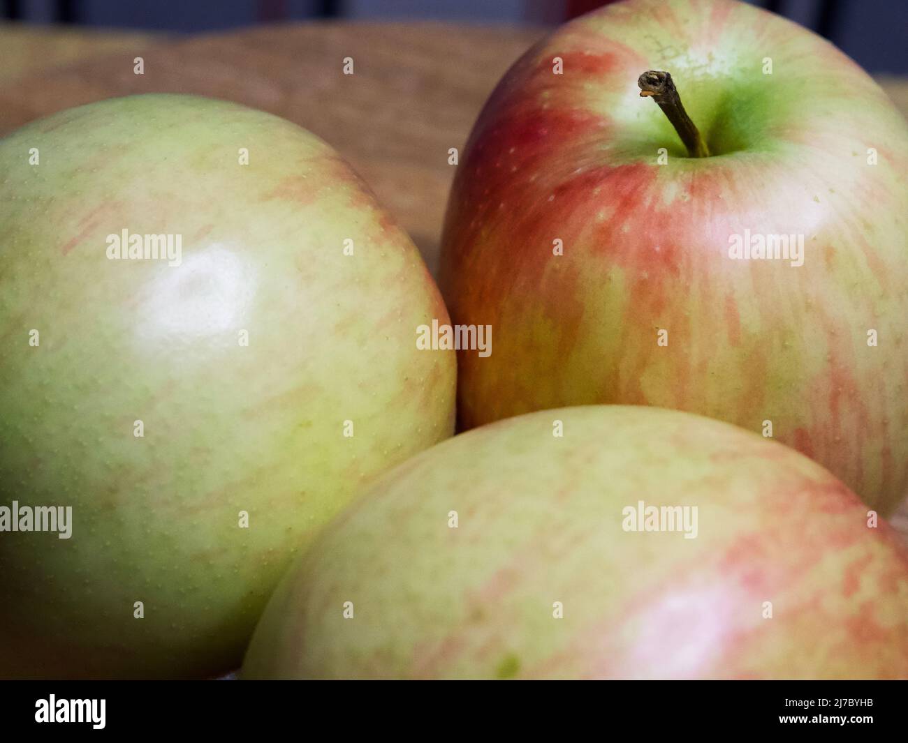 Three ripe gala apples, a closeup shot. Fruits, macro photos Stock