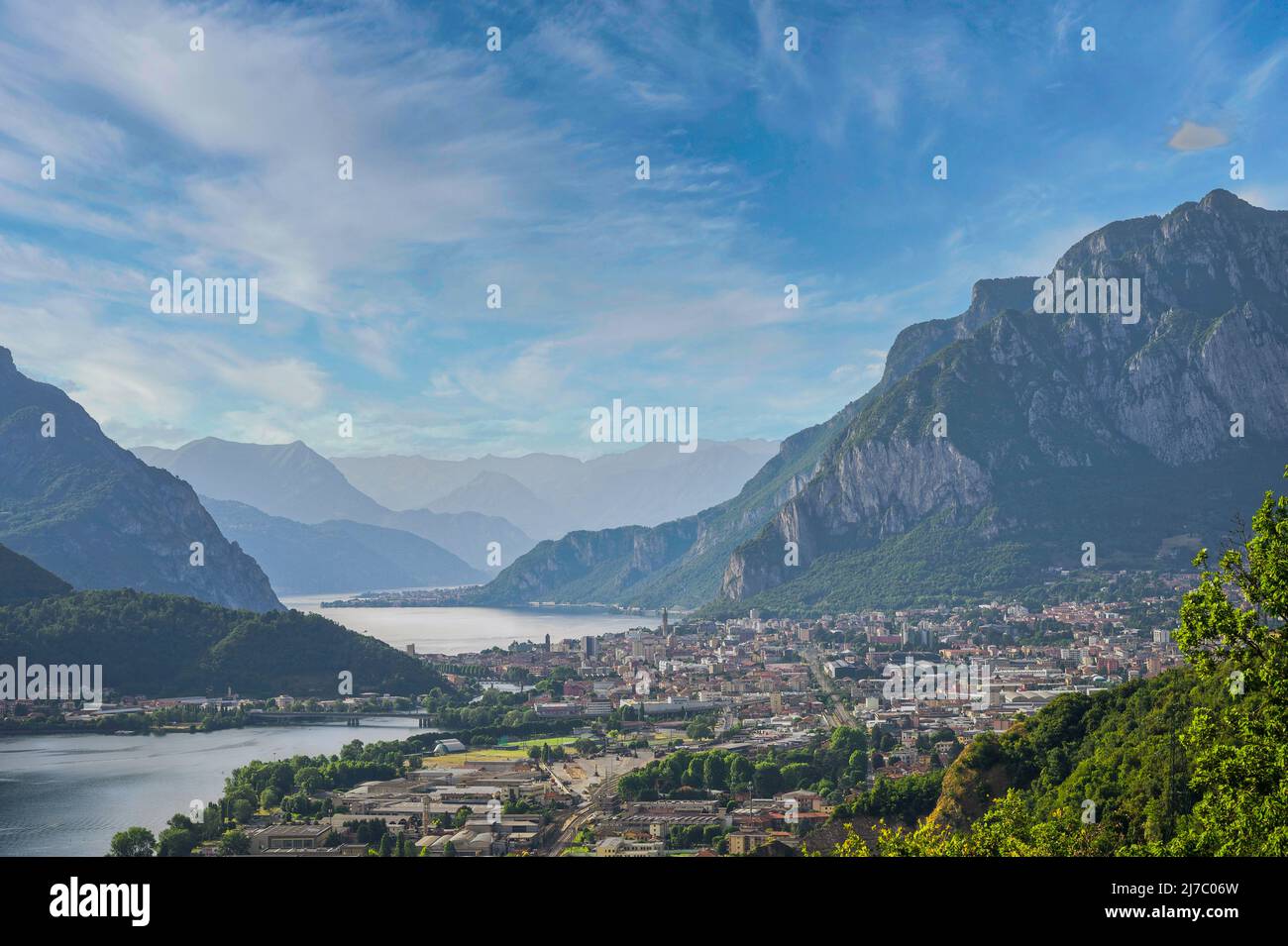 City of Lecco and Lake Como with mountains seen from the castle of the Innominato, Lecco, Italy Stock Photo