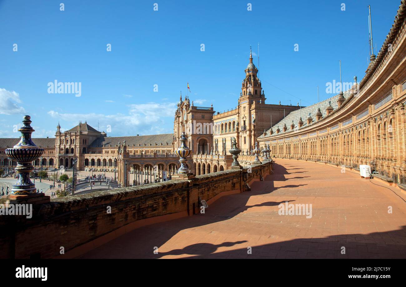 A wide view of  the The Plaza de Espana, showing the pavillions and terrace,   in Seville, Spain. April 2022 Stock Photo