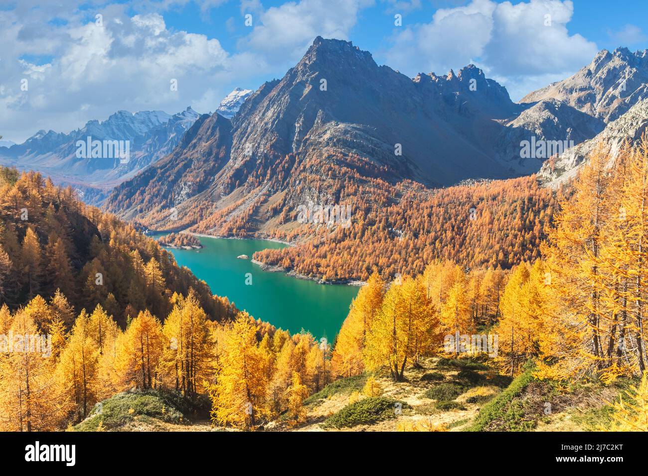 Excellent autumn view of the lake Devero in sunny day. Location place Devero, Italy. Scenic image of famous landmark. Natural wallpapers. Discover the Stock Photo