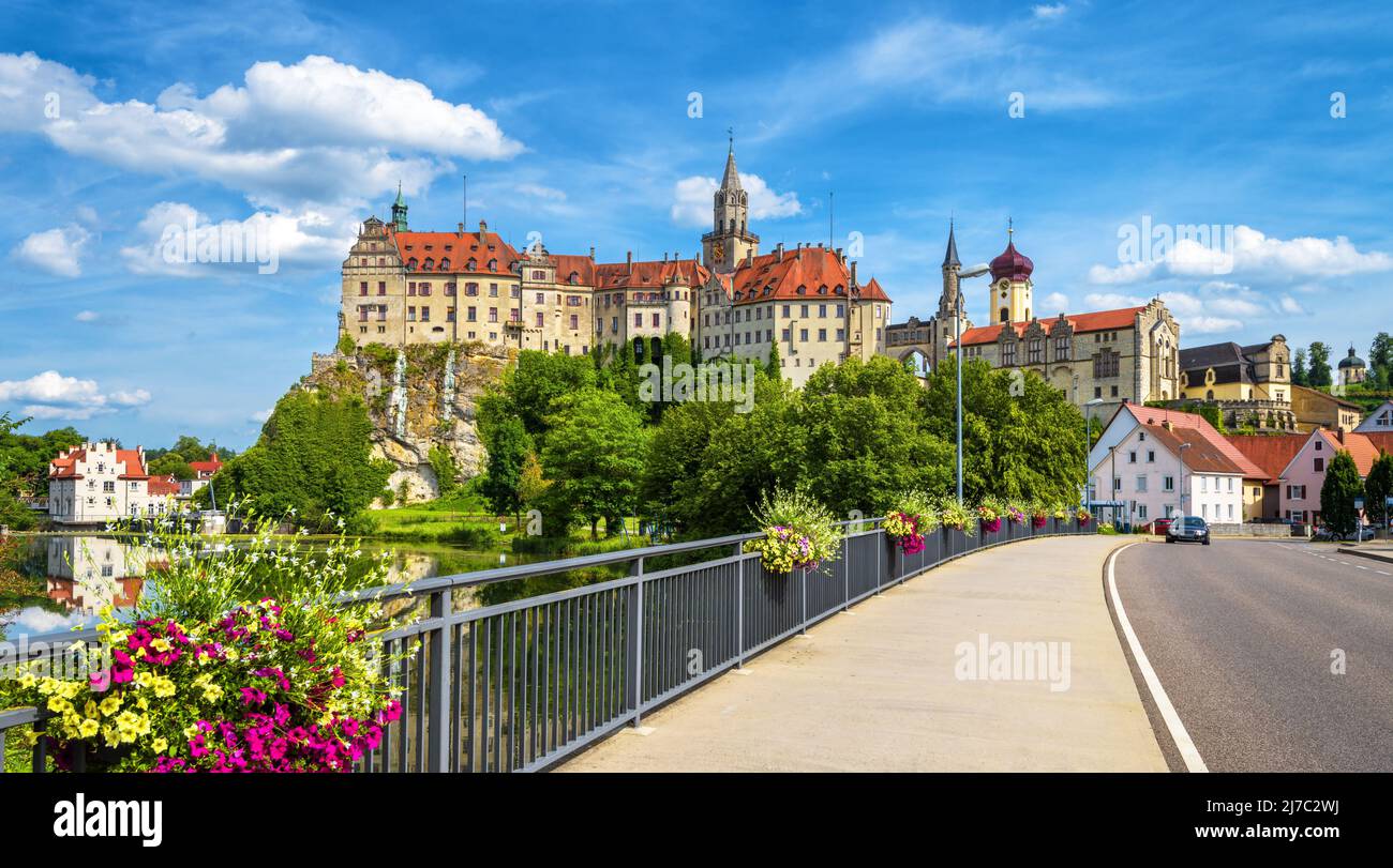 Sigmaringen city in Baden-Wurttemberg, Germany, Europe. View of Hohenzollern castle, landmark of Schwarzwald from road bridge across Danube river. Pan Stock Photo