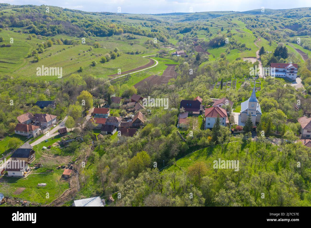 Aerial view of a typical Hungarian village in Transylvania, Romania. Inaktelke, Inucu Stock Photo